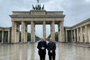 Cardinal Parolin, left, and Archbishop Nikola Eterović, apostolic nuncio to Germany, at the Brandenburg Gate in Berlin